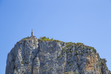 church and big roc in Castellane, Provence, France, Europe.