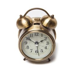 Brass metal alarm clock retro style.