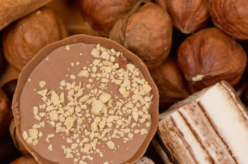 Closeup of coffee beans, cinnamon and nuts