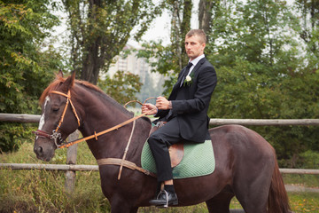 groom on horse