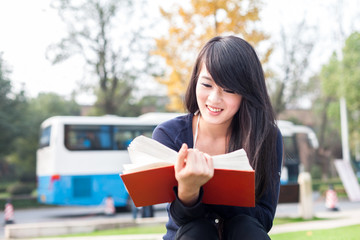 Fototapeta premium Young asian women with a book