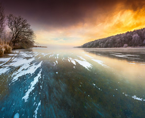Sunset on the frozen lake.