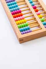 Chinese calculator with colorful beads - Close-up. Concept photo