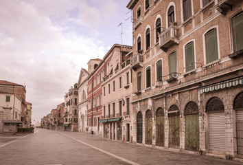 Fototapeta na wymiar Venetian street in the morning