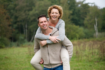 Cheerful couple enjoying life outdoors