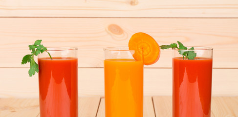 Two juices of tomato and carrot.