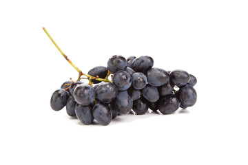 Bunch of ripe and juicy black grapes.