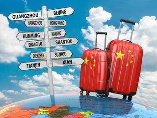 Obraz premium Travel concept. Suitcases and signpost what to visit in China.