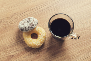 Two donuts and hot coffee