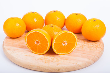 Oranges isolated cut set on wooden base