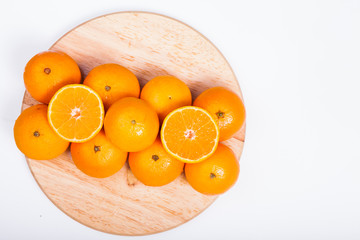 Oranges isolated cut set on wooden base