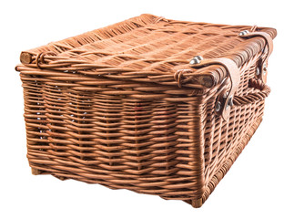 Handmade wicker picnic basket over white background