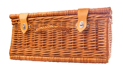 Handmade wicker picnic basket over white background