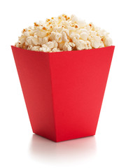 Full red bucket of popcorn.