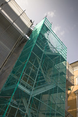 Naklejka premium Scaffolding to work on the facade