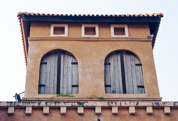 windows of Italian style building at Palio Khao Yai