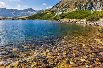 Mountain lake in 5 lakes valley in Tatra Mountains