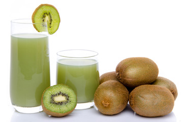 Composition with glasses of kiwi juice and fresh kiwis