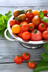 fresh and juicy tomatoes in a colander