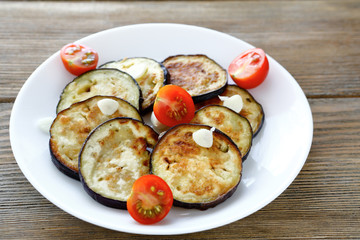 fried aubergine slices with garlic