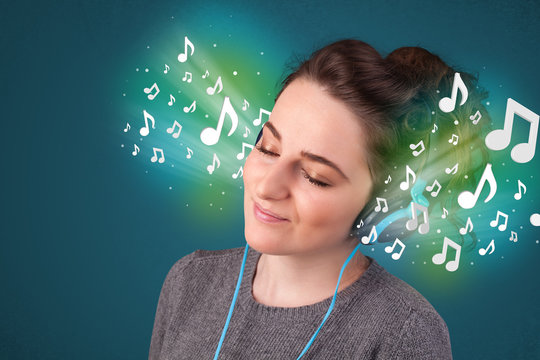 Young woman with headphones listening to music