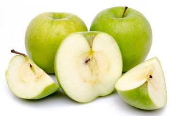 Ripe green apples with slices