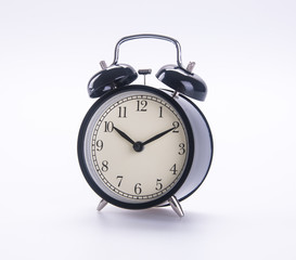 Naklejka premium alarm clock. alarm clock on the background.