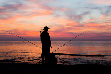 Fototapeta premium Fishing at sunset