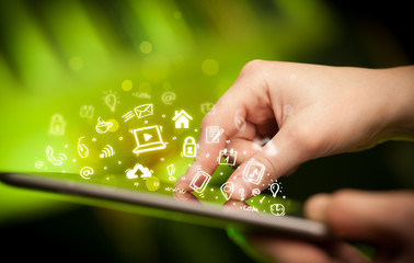 Finger pointing on tablet pc, social media concept