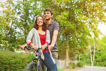 people in love - riding together on the same bicycle