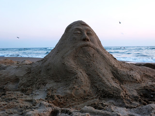 sand sculpture and the sea