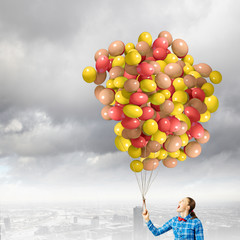 Woman with balloons