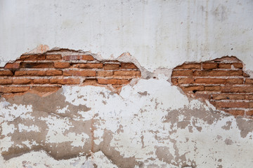 background texture from brick wall with cracked plaster