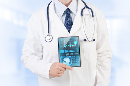 Doctor with medical analysis on tablet