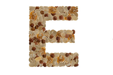 Letters of the alphabet written with nuts.