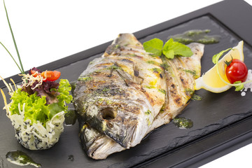 sea fish cooked on the grill