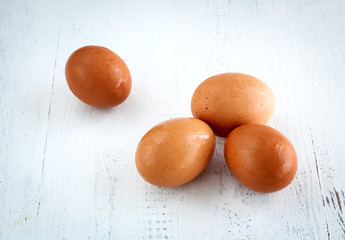 Eggs on wooden board