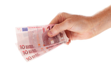 Hand holding three 10 euro bills