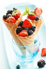 fresh berries in waffle cone
