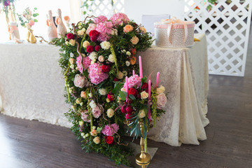 Floral arrangement to decorate the wedding feast, the bride and