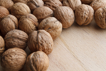 Walnut on wooden background
