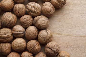 Walnut on wooden background