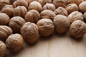 Walnut on wooden background