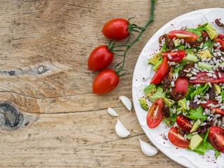 Vegetable salad on a wooden desk