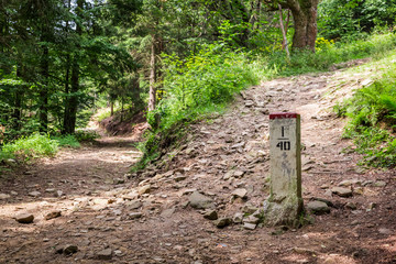 Border post on mountain trail