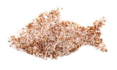 Crystals of sea salt in shape of fish, isolated on white