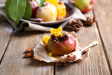 Baked apples on table close up