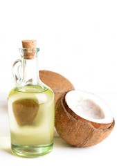 Coconut oil on table on light background