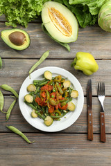 Healthy salad with peas and asparagus served