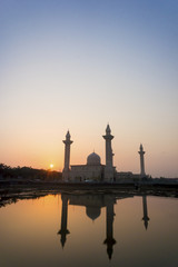 Fototapeta na wymiar Silhouette mosque at sunrise